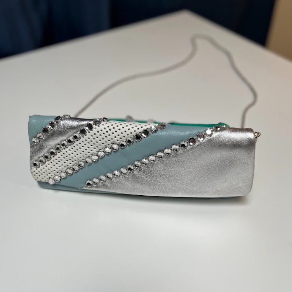 Ipa Nema Blue and Silver leather clutch